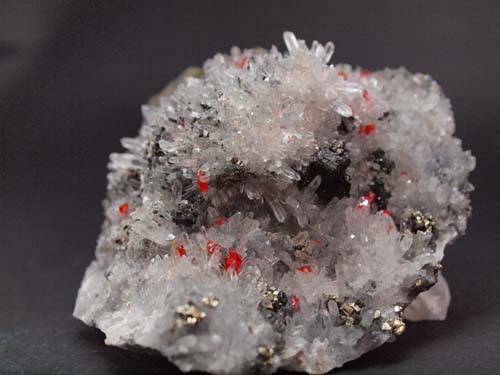 Quartz crystals with realgar crystals on it and sphalerite crystals.<br>Size 8cm x 8,5cm x 5cm