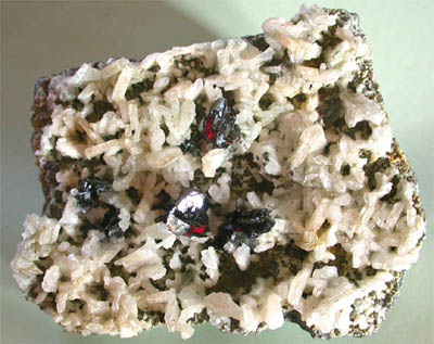 Hematite on albite